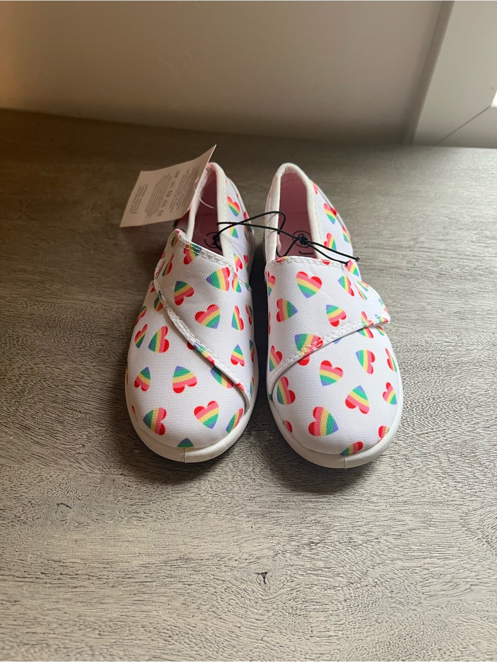 Kids White Slip-On Sneakers with Rainbow Heart Print
